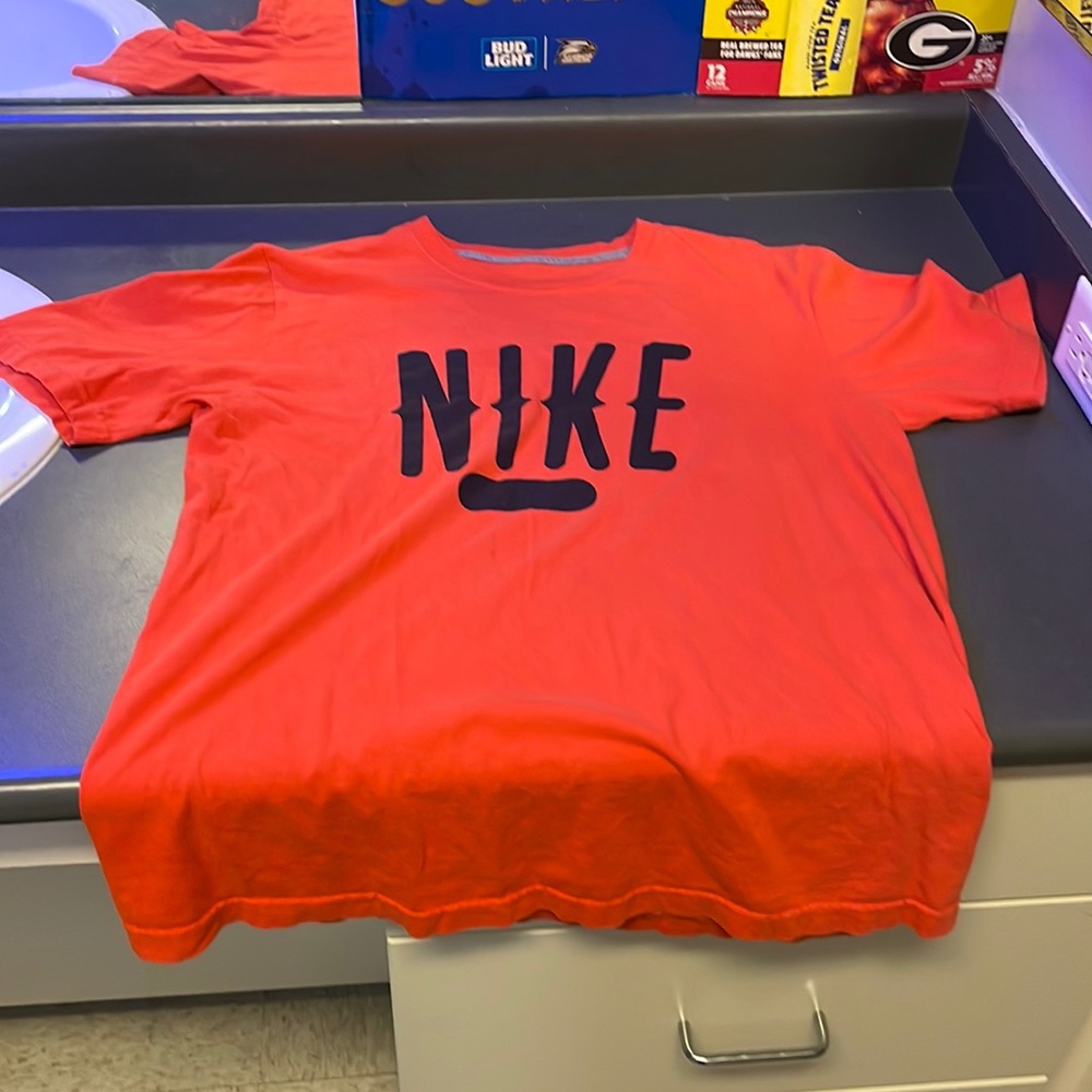 A medium orange Halloween edition Nike t-shirt